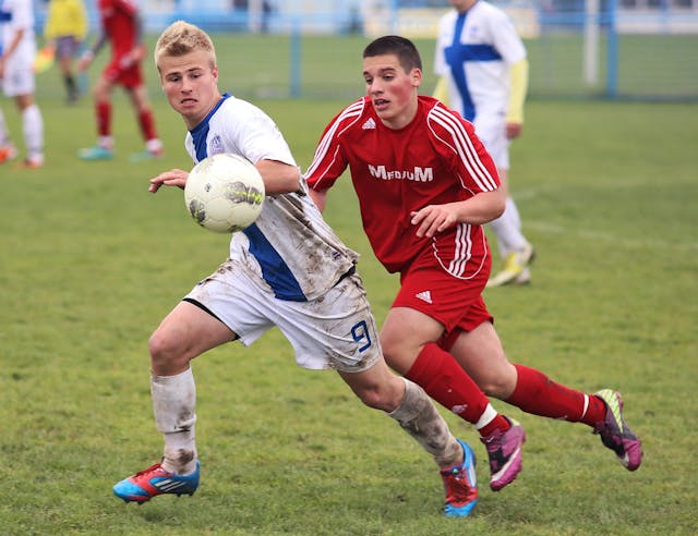 boys playing soccer